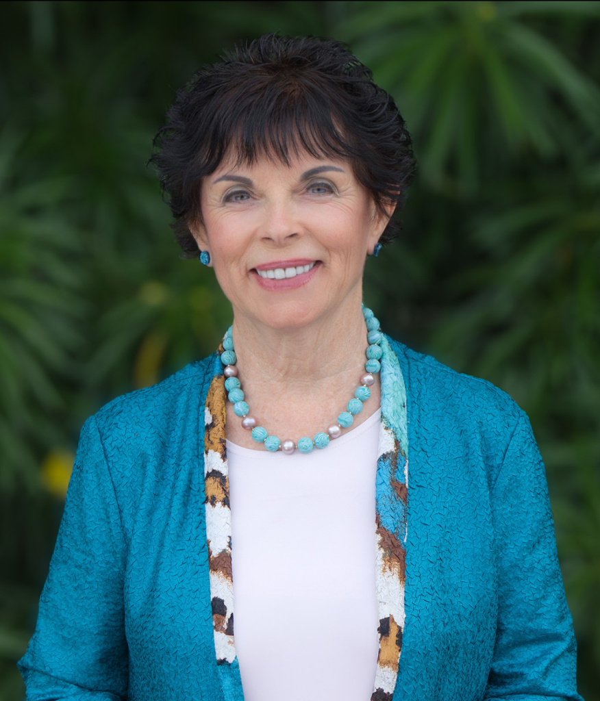 Dr. Carolyn Dean, MD, ND, smiling in a professional headshot with a natural background. Headshot of Dr. Carolyn Dean, author and health expert, in professional attire.
