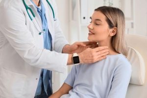 Group of midlife women walking outdoors with yoga mats, representing movement and hormone balance in midlife.