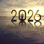Person meditating inside the numbers “2026” at sunrise, symbolizing a calm and restorative New Year reset