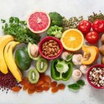 Mineral-rich foods including leafy greens, avocado, almonds, beans, bananas, citrus fruits, and vegetables that support cellular health, energy, and nutrition.